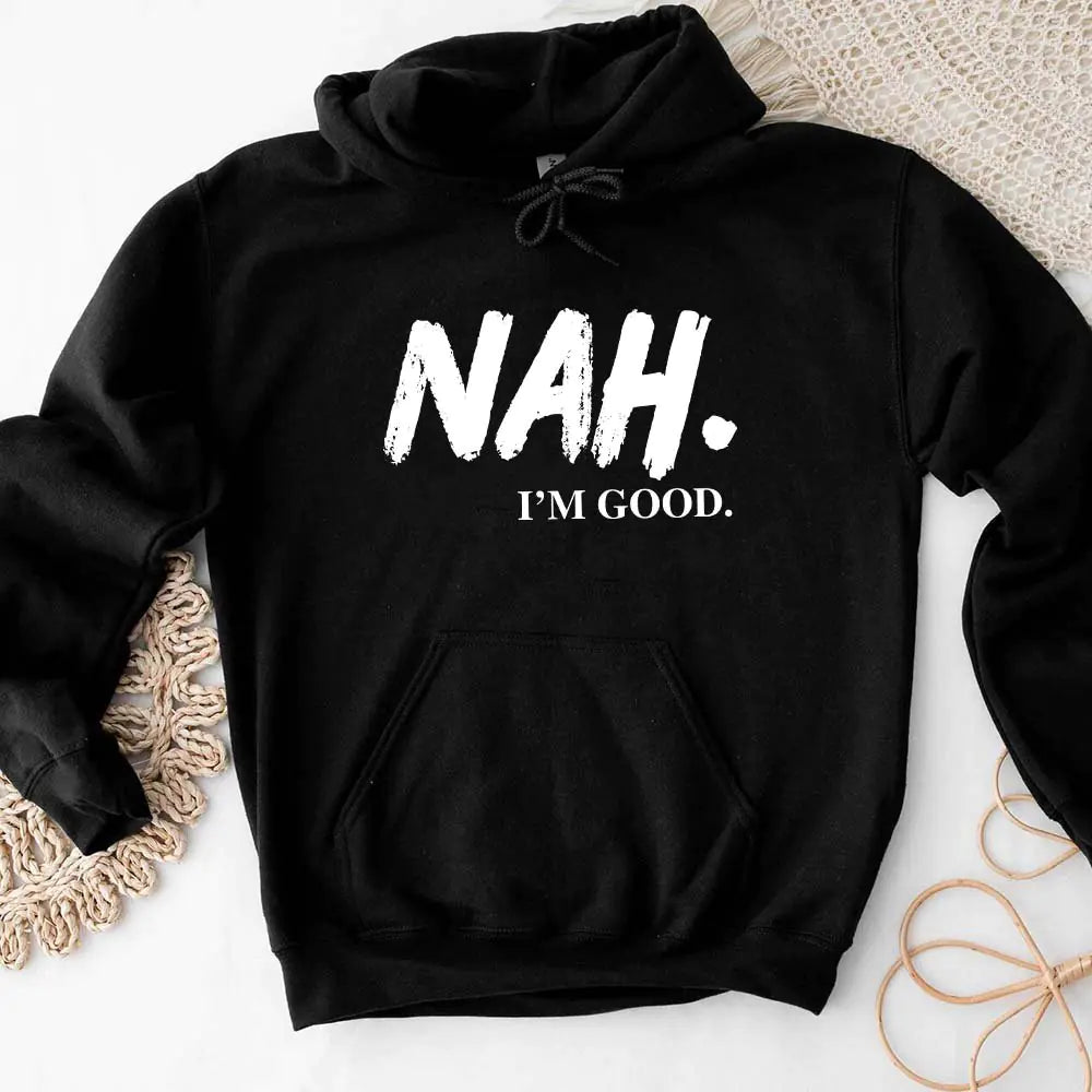 Black hoodie with 'NAH. I'M GOOD.' text on a white background