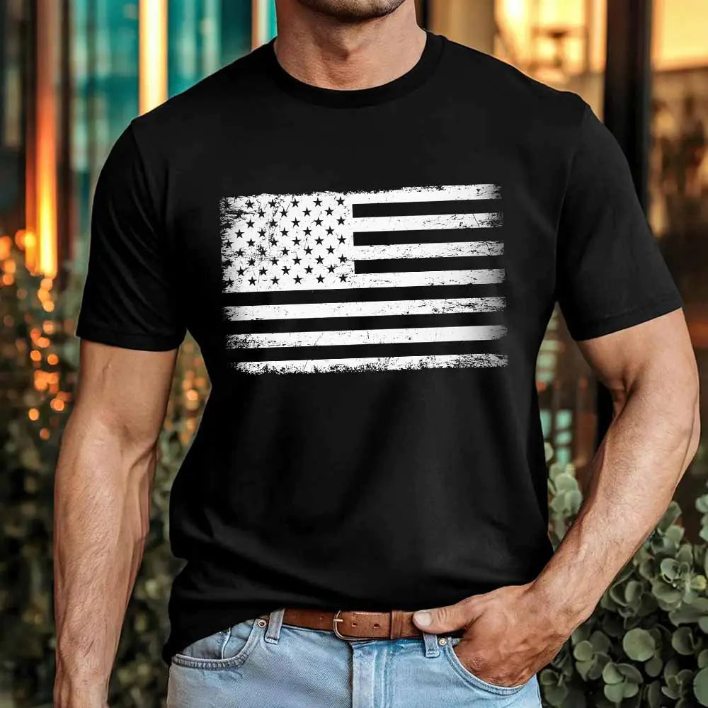 Person wearing a black t-shirt with a white American flag design.