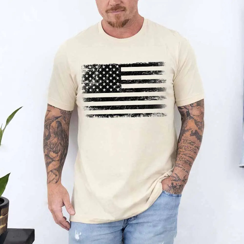 Man wearing a beige t-shirt with an American flag design on a white background