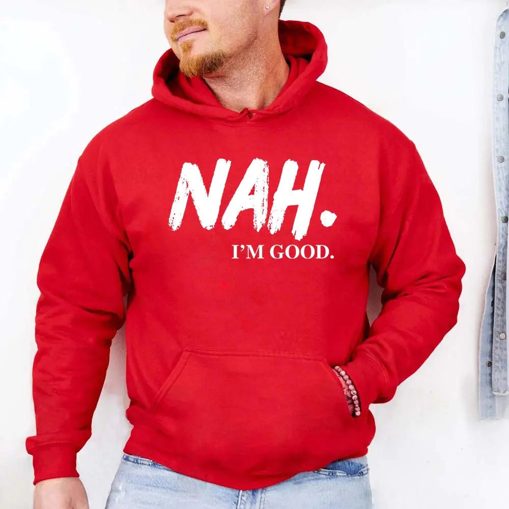 Person wearing a red hoodie with 'NAH. I'M GOOD.' text on a white background