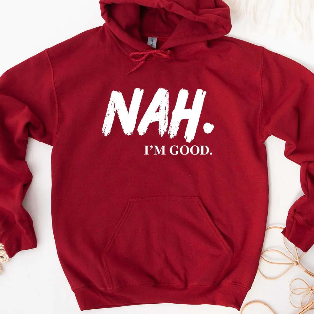 Red hoodie with 'NAH. I'M GOOD.' text on a white background