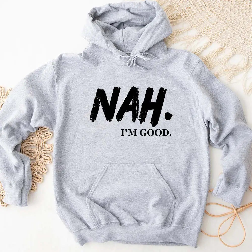 Gray hoodie with 'NAH. I'M GOOD.' text on a light background